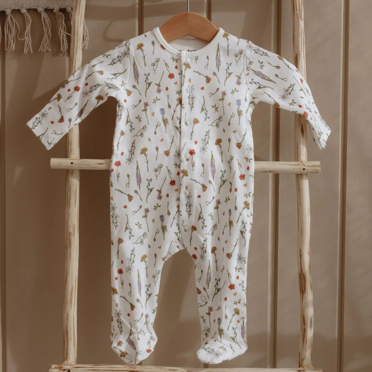 Spring Footed Onesie